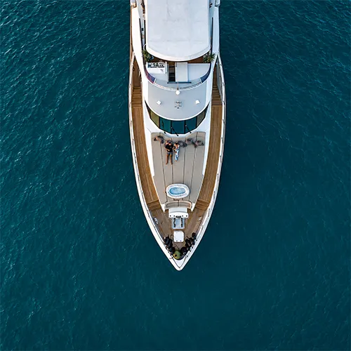 107ft VIP yacht aerial view above Dubai Marina waters | Dxb Charters